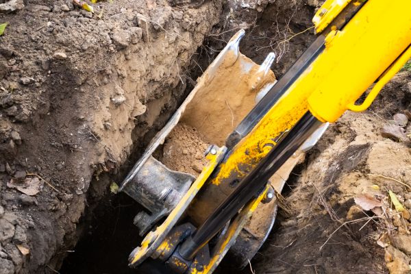Downspout Trenching Service